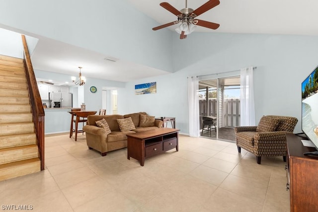 living room with light tile patterned floors, high vaulted ceiling, and ceiling fan with notable chandelier