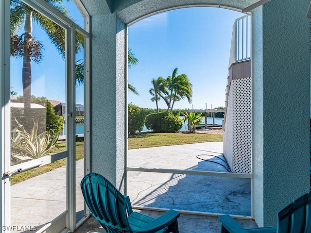 doorway featuring a water view