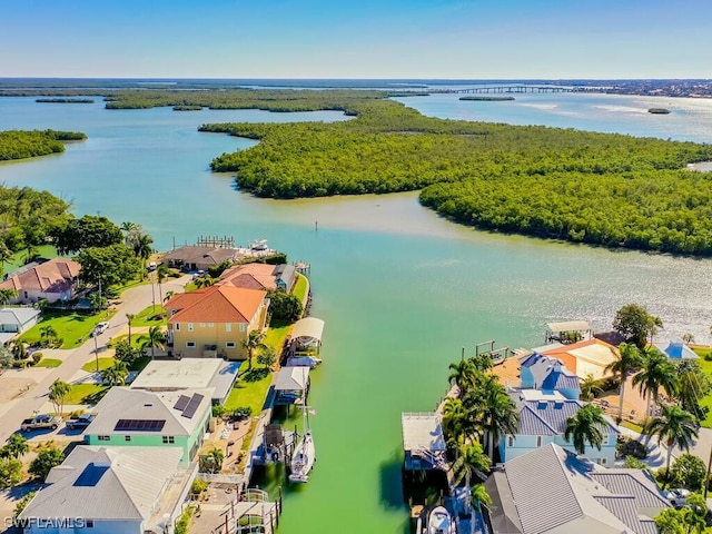 bird's eye view with a water view