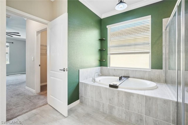 bathroom featuring plus walk in shower, tile patterned floors, and crown molding