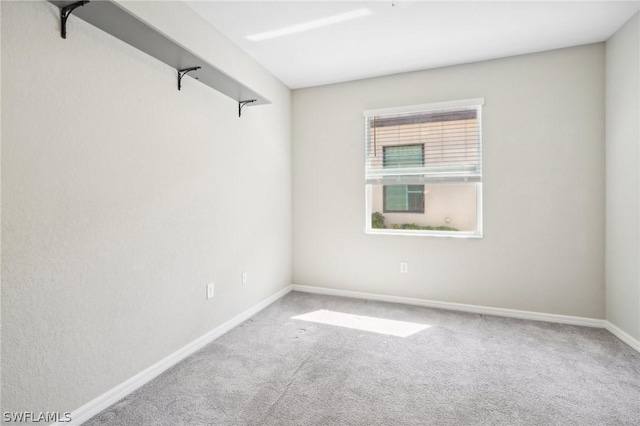 empty room with carpet flooring