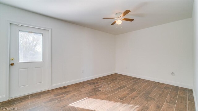 interior space with ceiling fan and hardwood / wood-style flooring