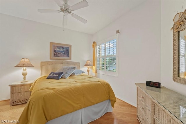 bedroom featuring ceiling fan and light wood-type flooring