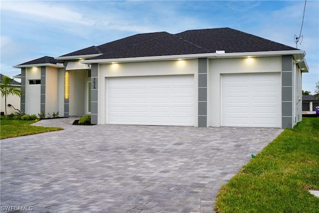 view of front of property featuring a garage