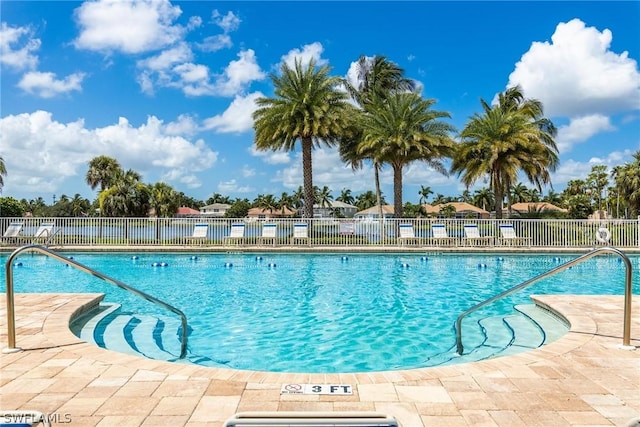 view of swimming pool featuring a patio