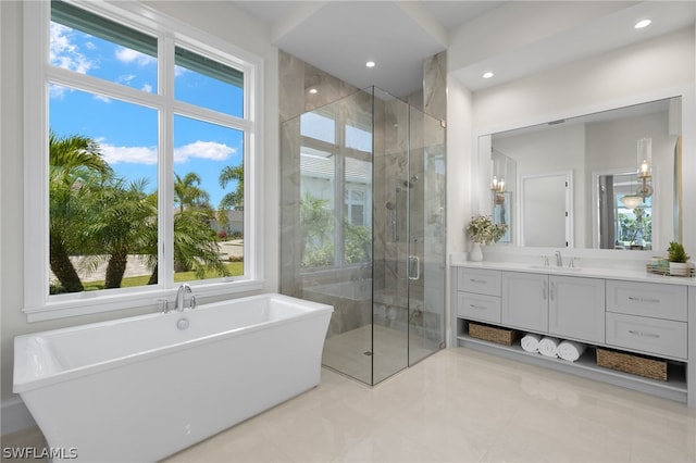 bathroom featuring tile flooring, vanity, and plus walk in shower