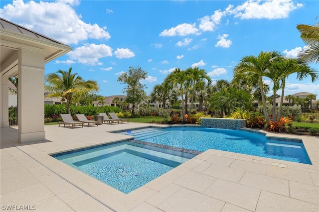 view of pool featuring a patio area