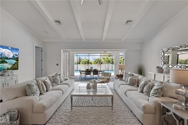 living room featuring vaulted ceiling with beams