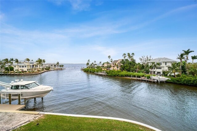 dock area featuring a water view