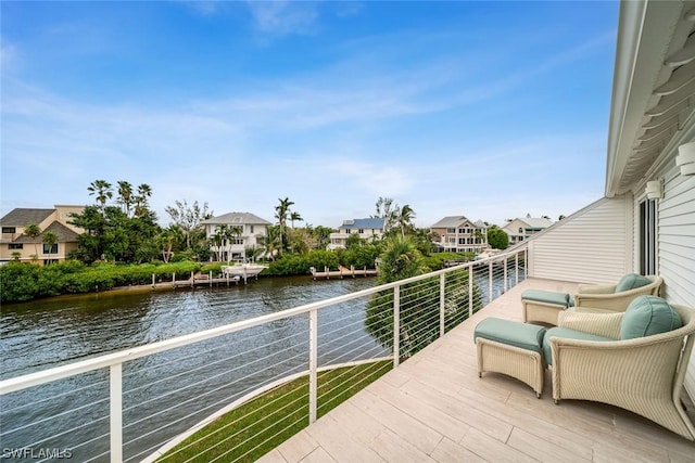 deck featuring a water view