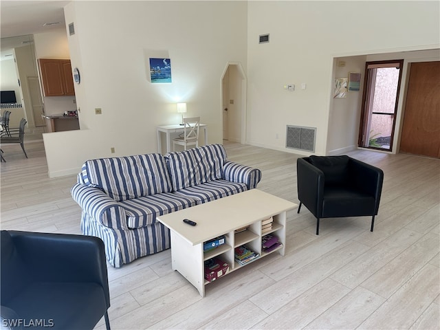 living room with light hardwood / wood-style flooring