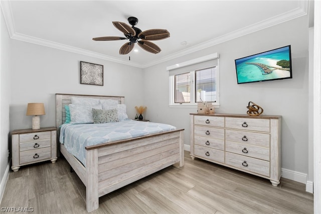 bedroom with ornamental molding, ceiling fan, and light hardwood / wood-style floors