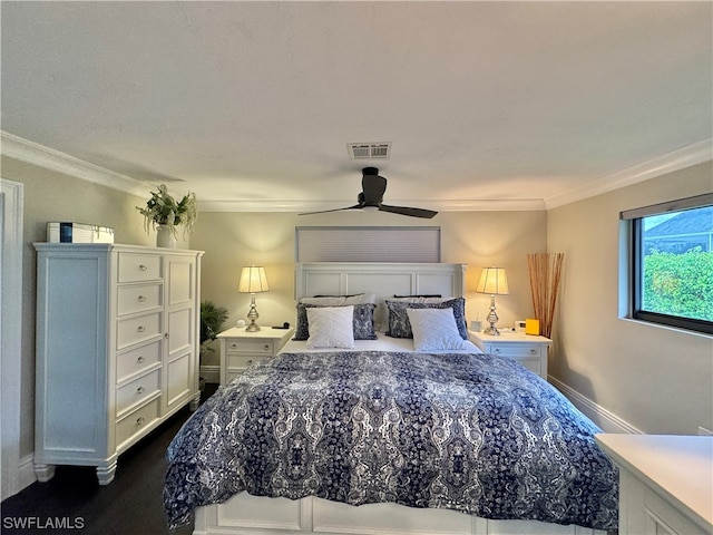 bedroom with ornamental molding and ceiling fan