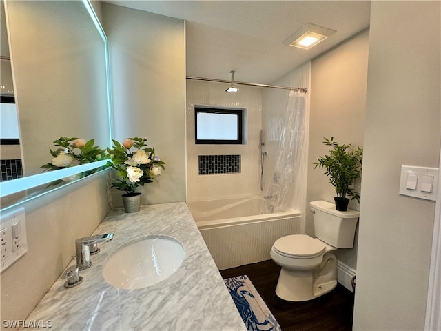 full bathroom with shower / tub combo with curtain, vanity, hardwood / wood-style flooring, and toilet