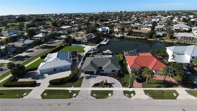 drone / aerial view featuring a water view