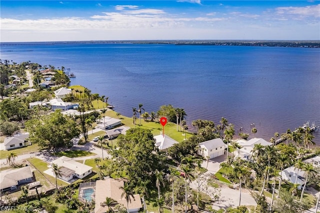 aerial view with a residential view and a water view