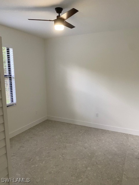 spare room featuring ceiling fan