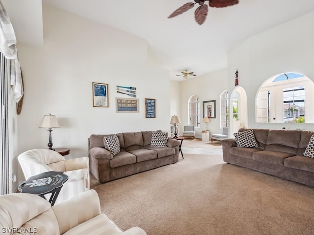 living room featuring ceiling fan and carpet floors