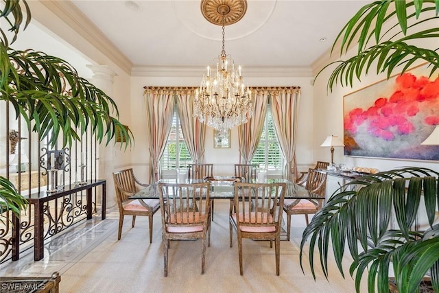dining room featuring a notable chandelier and ornamental molding