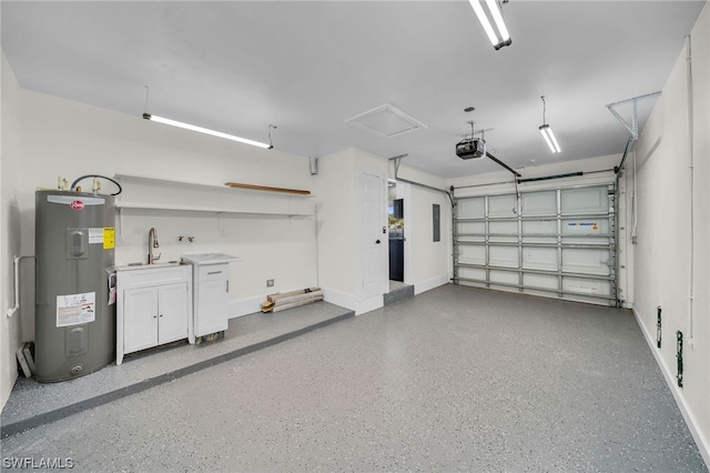 garage with a garage door opener, water heater, and sink