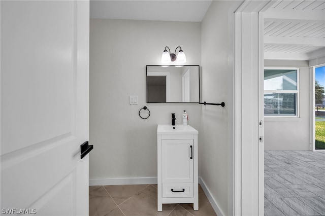 bathroom featuring wood ceiling, plenty of natural light, tile flooring, and beamed ceiling