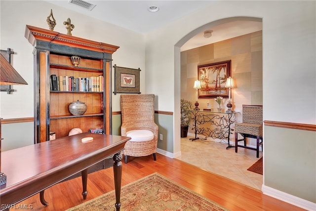 living area with wood-type flooring