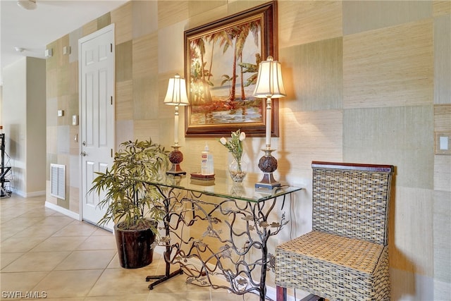 hallway with tile patterned flooring and tile walls