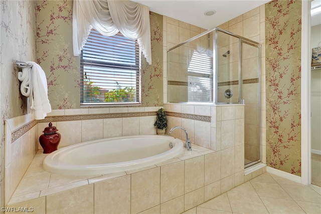 bathroom featuring tile patterned flooring and plus walk in shower