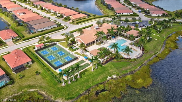 birds eye view of property featuring a water view