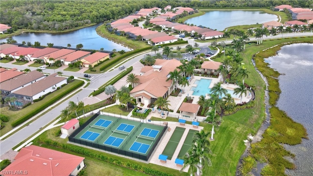 birds eye view of property featuring a water view