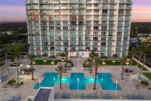3000 Oasis Grand Blvd Unit 1507, Fort Myers, FL 33916 - view of pool at dusk