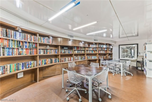 3000 Oasis Grand Blvd Unit 1507, Fort Myers, FL 33916 - interior space featuring wall of books and visible vents