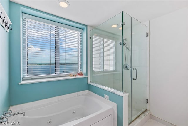 3000 Oasis Grand Blvd Unit 1507, Fort Myers, FL 33916 - bathroom featuring recessed lighting, a shower stall, and a tub with jets
