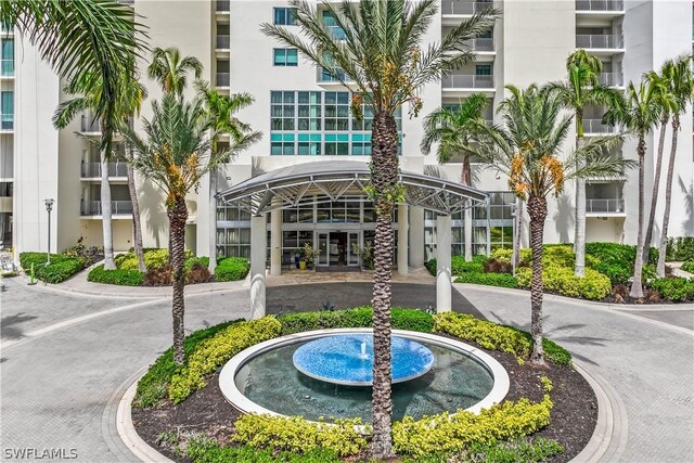 3000 Oasis Grand Blvd Unit 1507, Fort Myers, FL 33916 - view of property featuring curved driveway