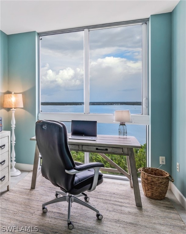 office area featuring a water view