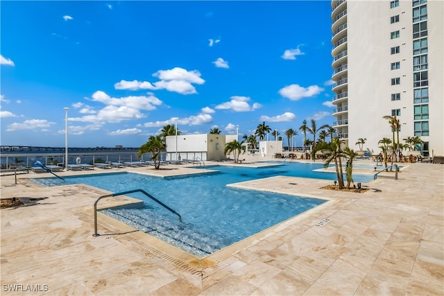 view of pool featuring a patio