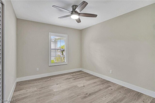 empty room featuring light hardwood / wood-style floors and ceiling fan