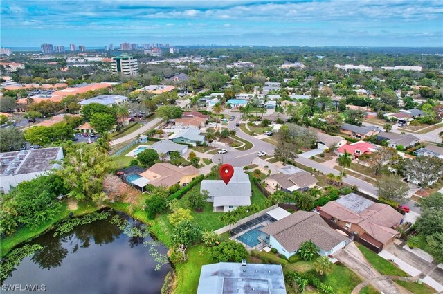 bird's eye view with a water view