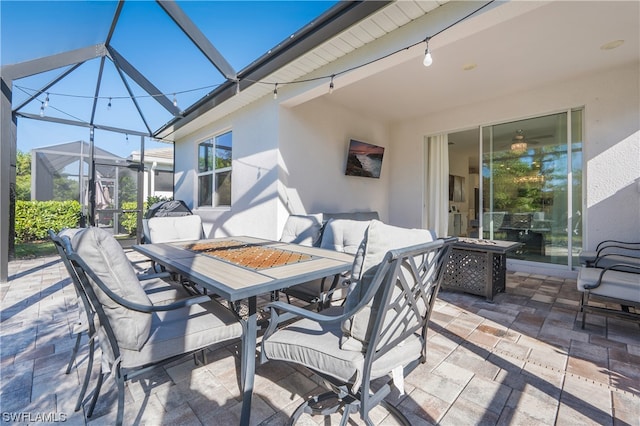 exterior space with ceiling fan and track lighting