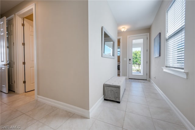 interior space featuring light tile patterned floors