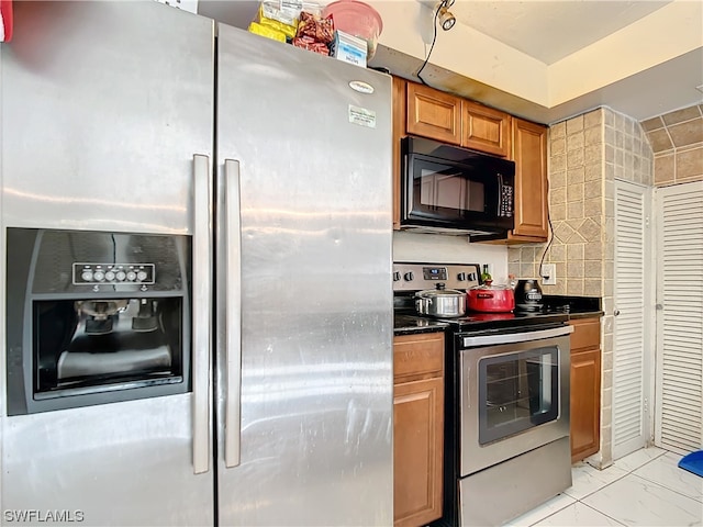 kitchen with appliances with stainless steel finishes