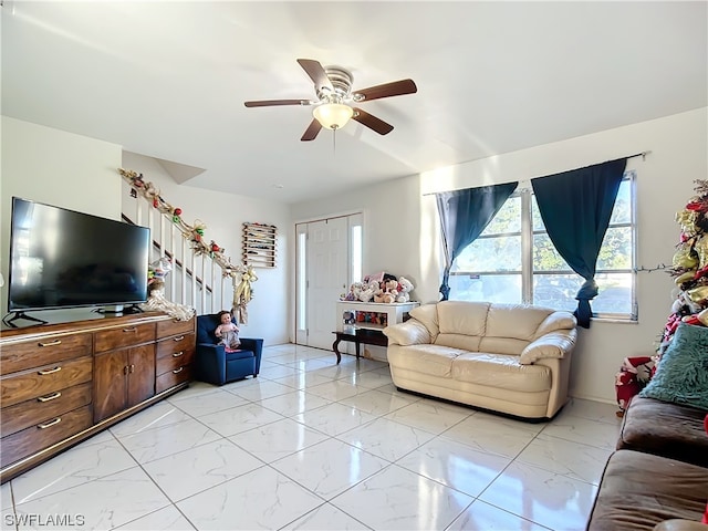 living room with ceiling fan