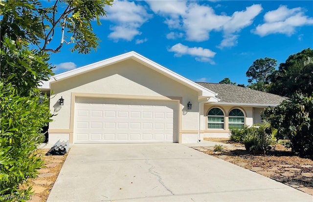 single story home with a garage