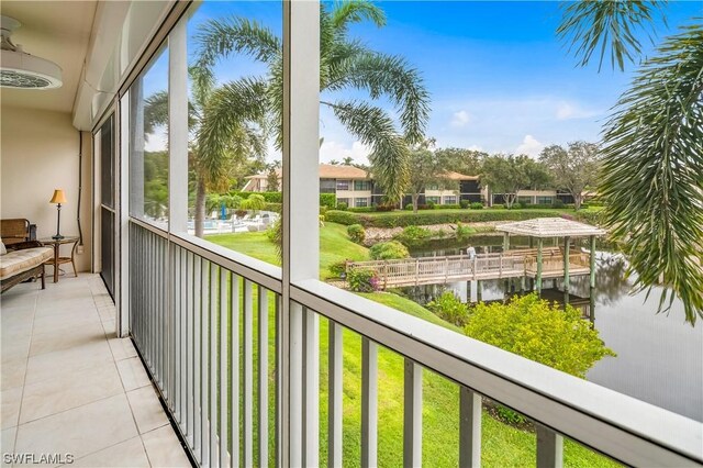 balcony featuring a water view