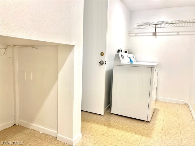 laundry room featuring separate washer and dryer