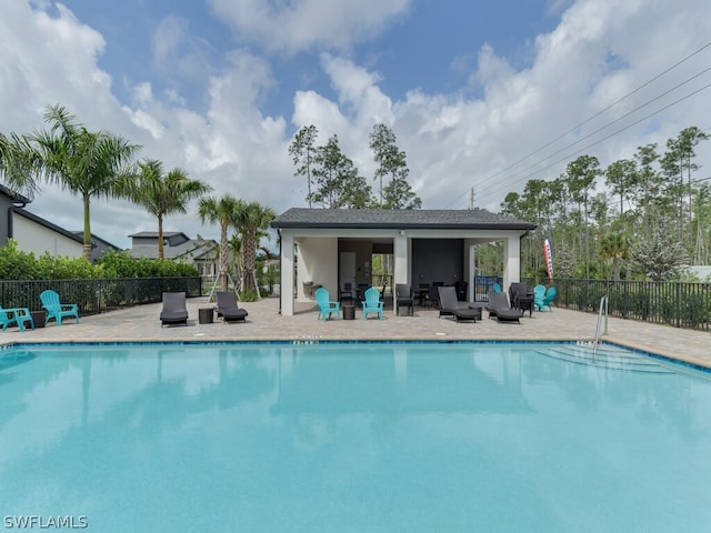 view of swimming pool featuring a patio