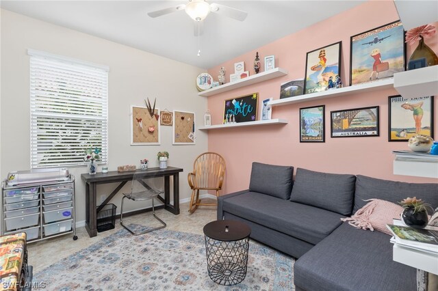 living room with light colored carpet and ceiling fan