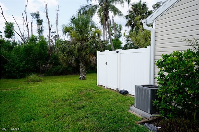 view of yard featuring central AC unit