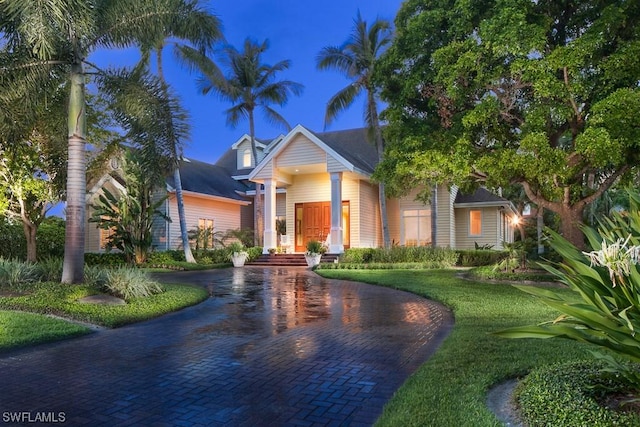 view of front of property with a front lawn