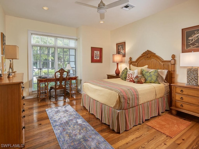 bedroom featuring hardwood / wood-style floors